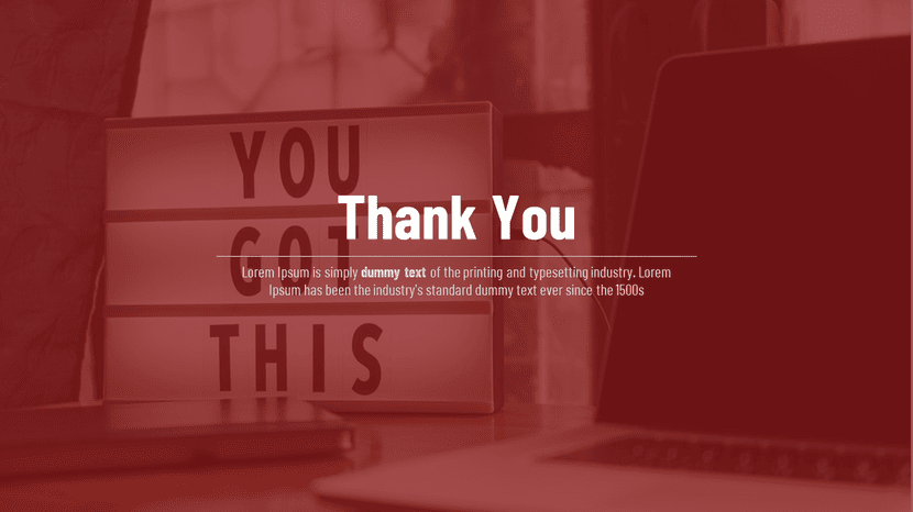 Red toned thank you slide displayed on laptop with minimal text and professional mood.