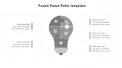 Attractive Puzzle PowerPoint Template In Bulb Model