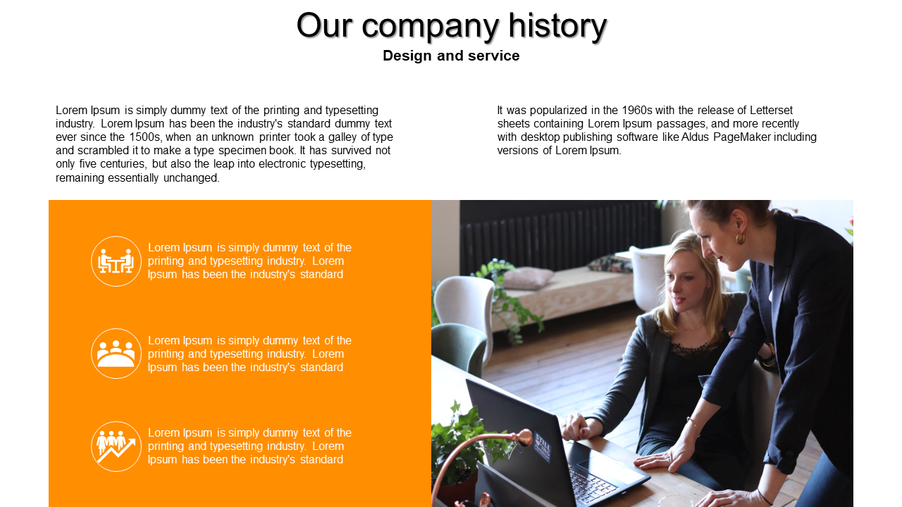 Two women collaborating on a laptop, reviewing the company history PowerPoint presentation.