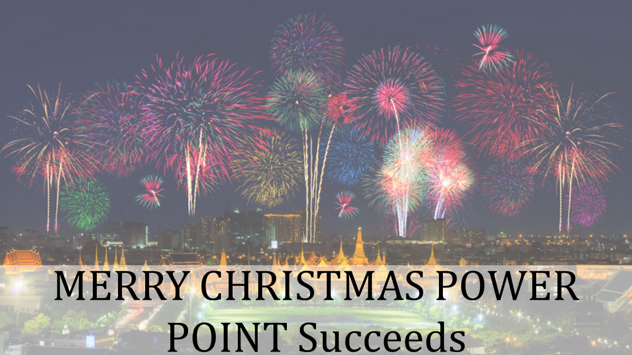 A fireworks display in the sky with the words Merry Christmas PowerPoint succeeds overlaid.