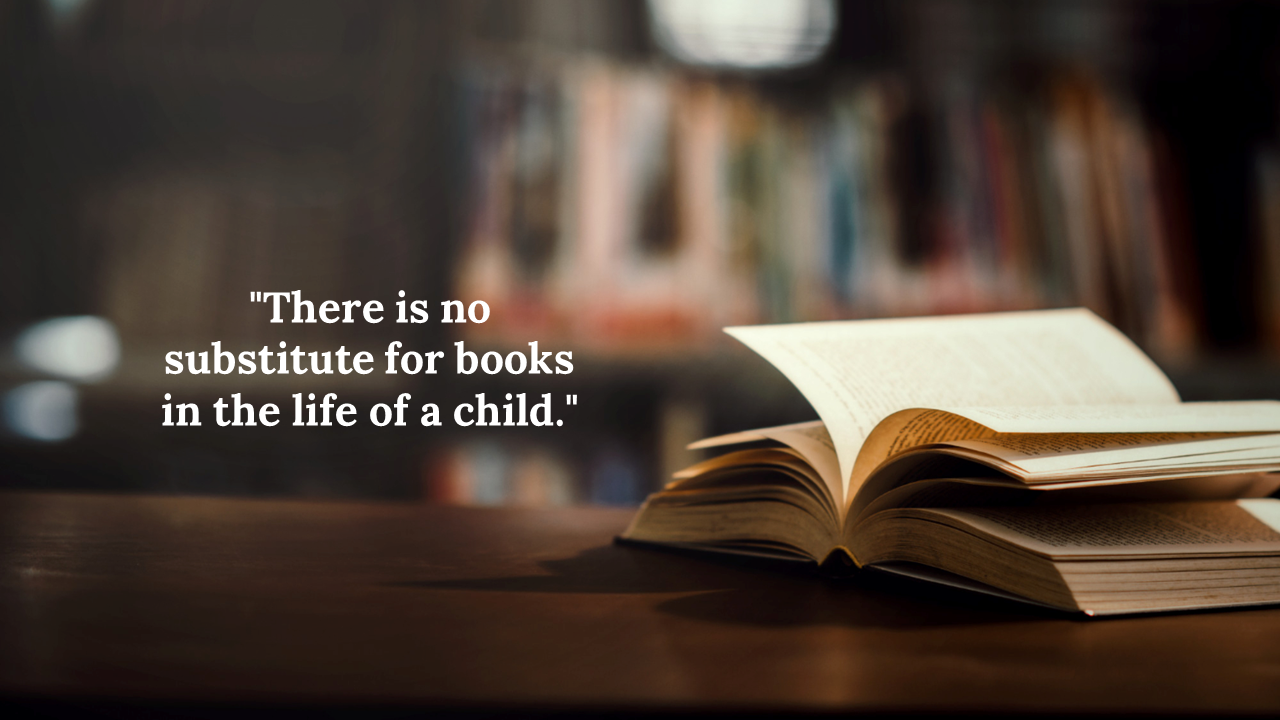 Close up of an open book on a wooden surface, surrounded by a blurred bookshelf, with natural, soft lighting.