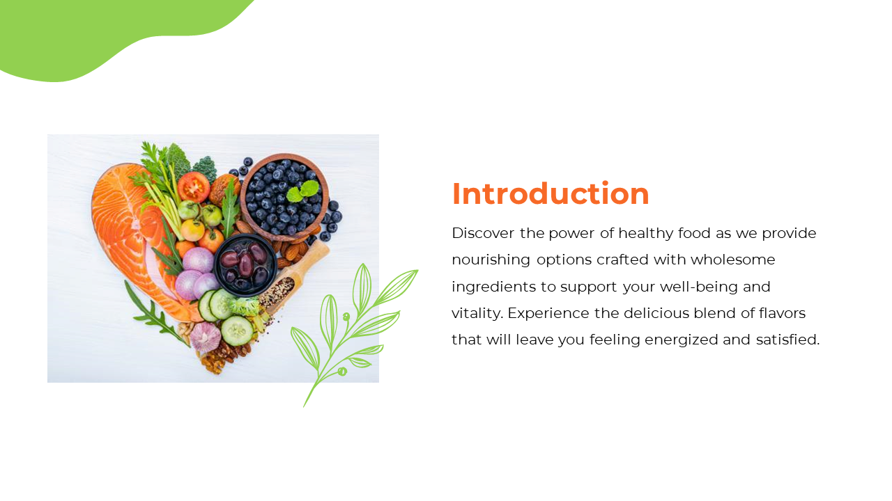Slide with a heart shaped arrangement of fresh food items like salmon, fruits, and vegetables, and green leaf accents.