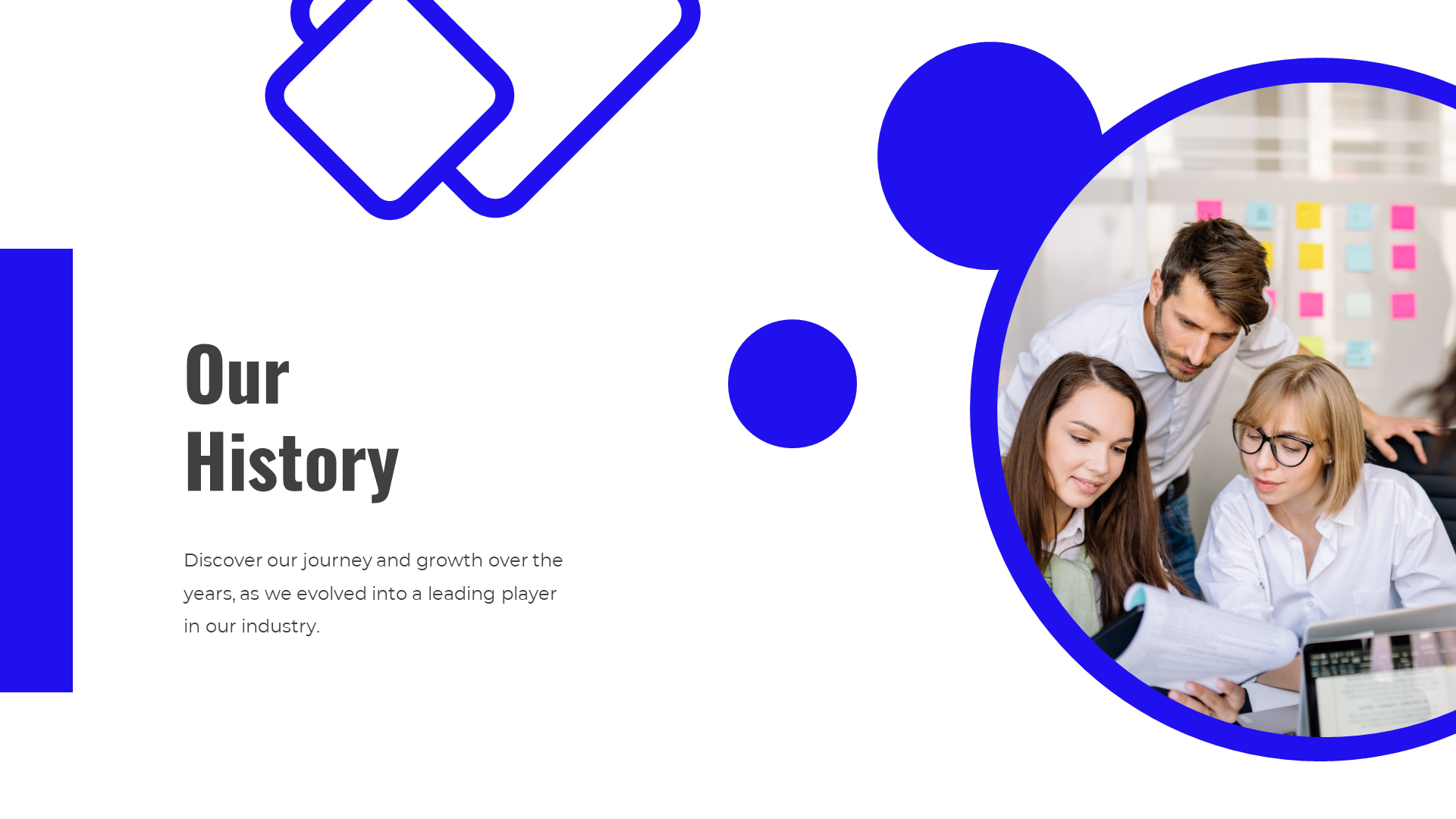 Our history slide with a collaborative team reviewing documents in an office, with blue geometric shapes framing the image.