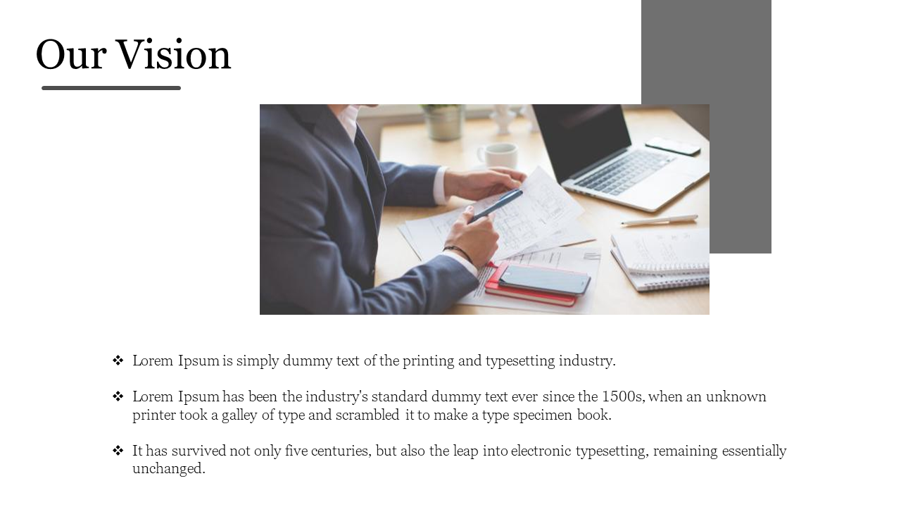 Our Vision slide features a business person working at a desk with documents and a laptop on a white backdrop.