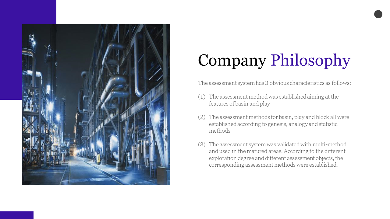 Industrial themed layout featuring a blue lit factory photo, with purple corner blocks, and structured text area.