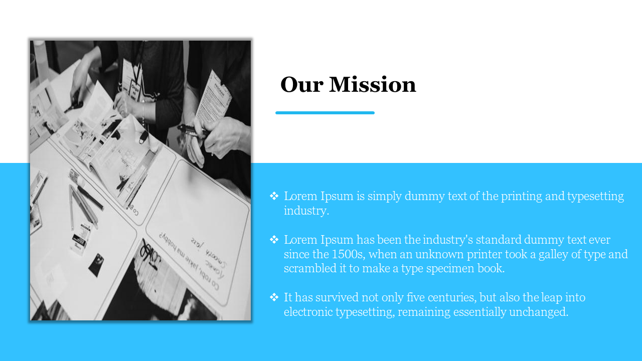 Slide featuring a blue section below featuring bullet points with text, and a black and white photo of people working.