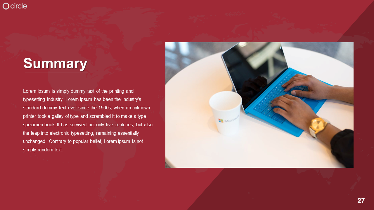Workspace setup with a laptop, coffee cup, and hands typing on a blue keyboard, set against a red background.