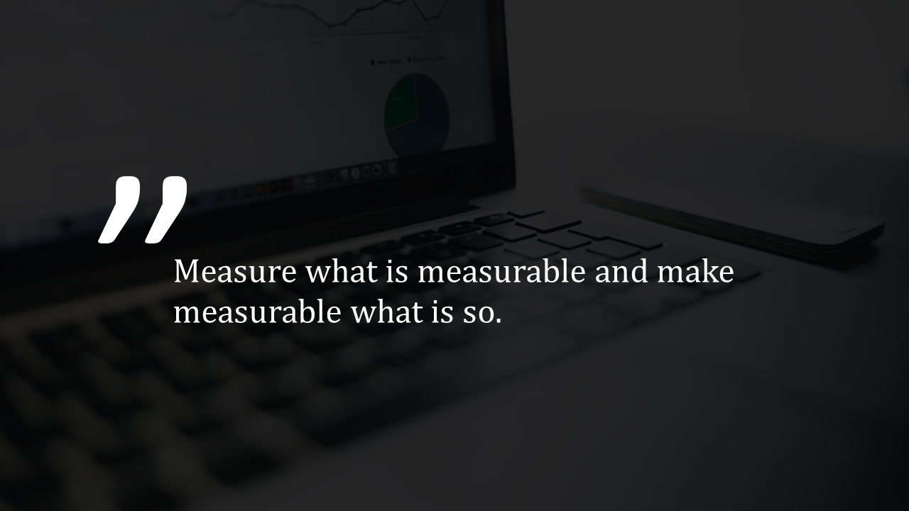 Large white quotation marks and KPI quote centered over a dark, blurred image of a laptop with graphs and a pie chart.