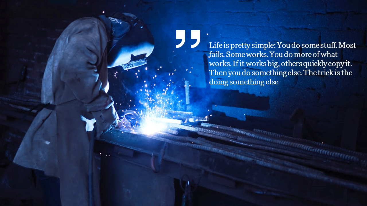 Welder in protective gear works with bright blue sparks in a dark workshop, overlayed with an inspirational quote.