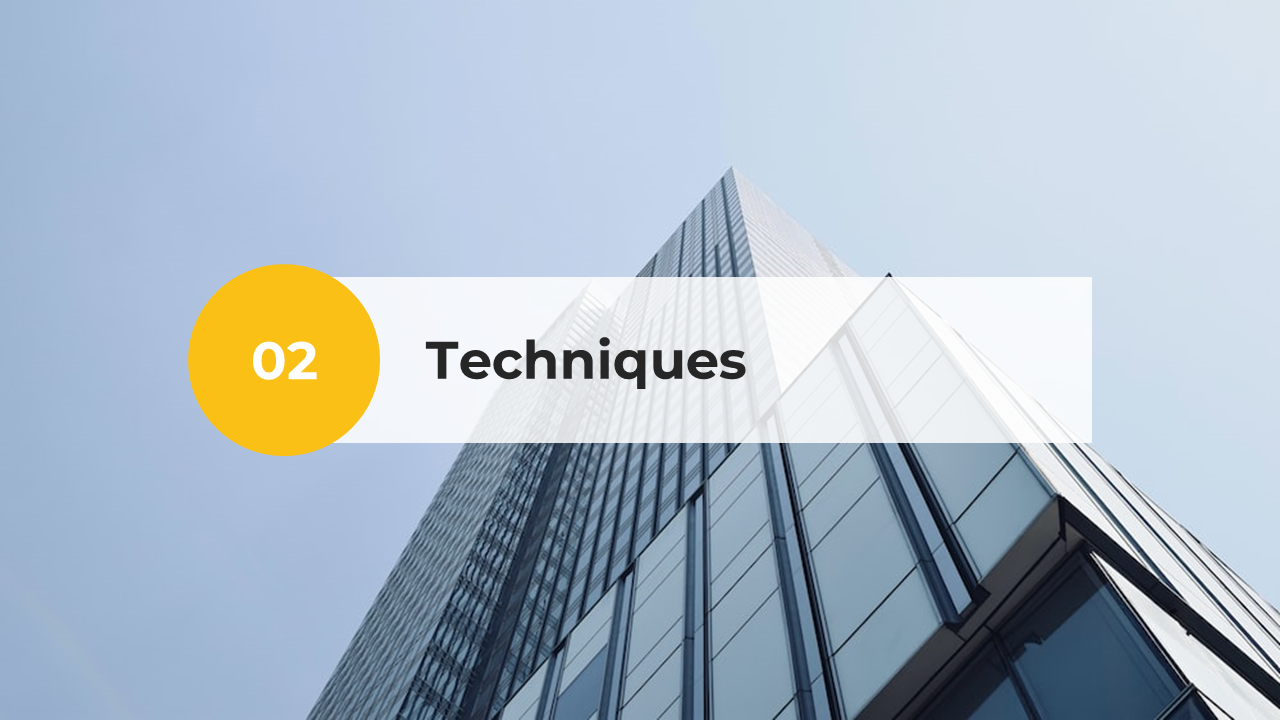 Techniques slide with a modern glass skyscraper viewed from below against a clear sky.