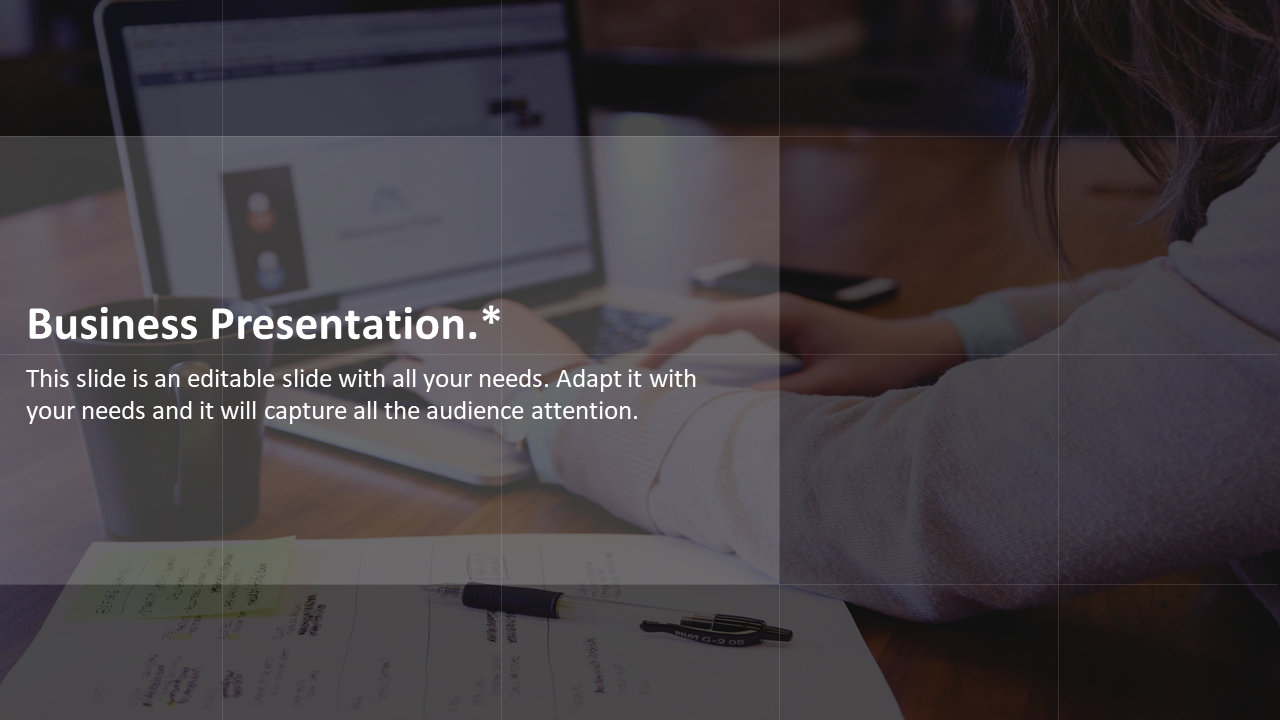 Business presentation slide with a person working on a laptop, featuring text and a note.