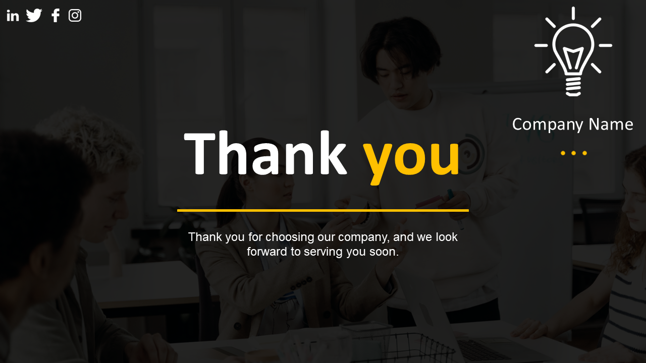 A thank you slide with a lightbulb logo and company name text, shows a blurred dark image of people in the background.