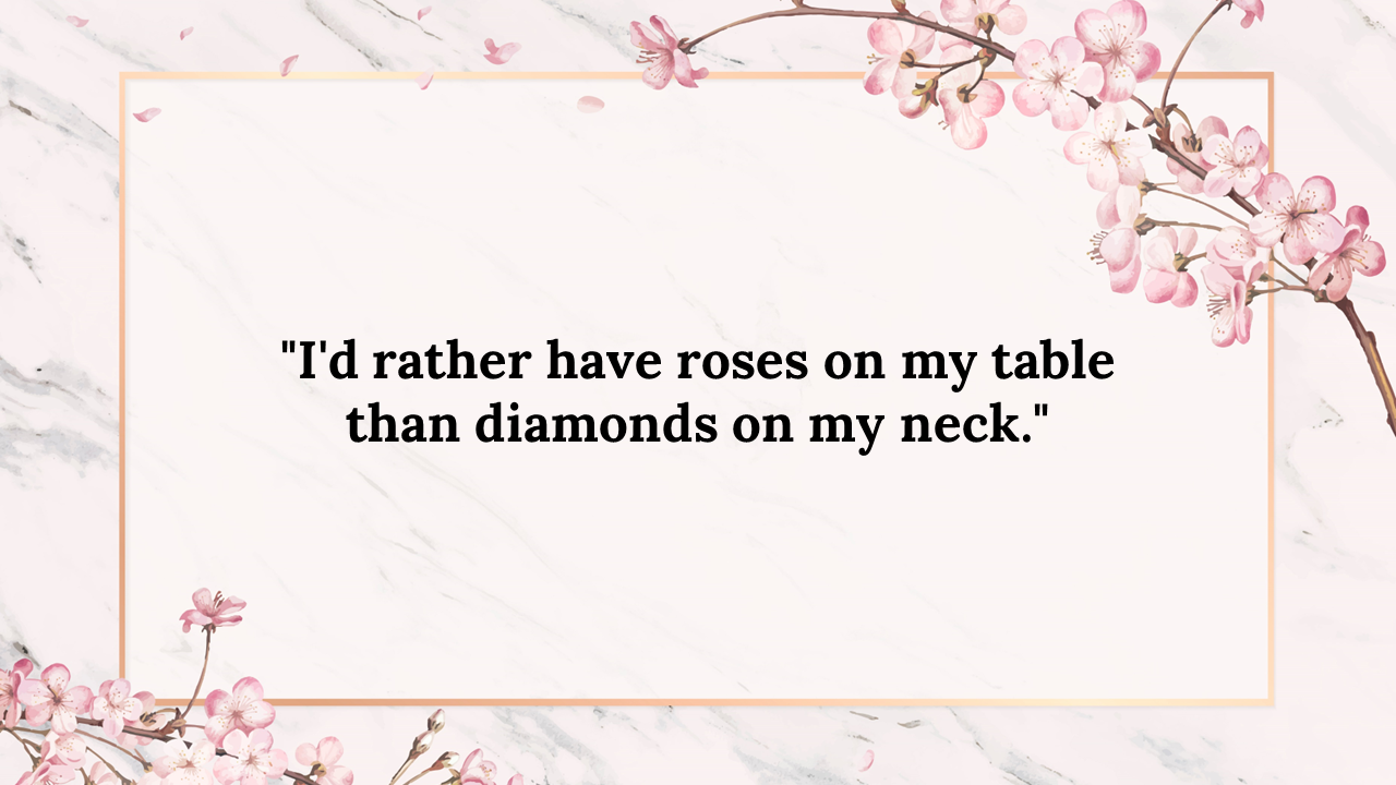 A slide displaying the quote with a floral design border of pink flowers.