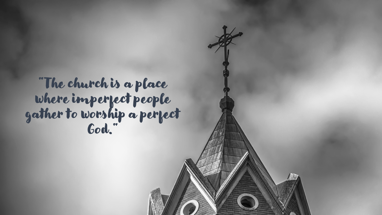 Black and white image of a church spire, featuring intricate architectural details and a cloudy sky in the background.