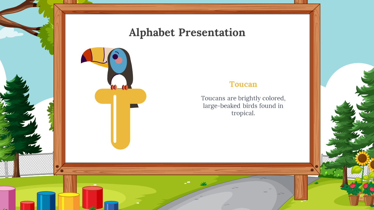 Yellow T with a colorful toucan perched on top, placed on a wooden framed whiteboard, outdoor park with trees and blocks.