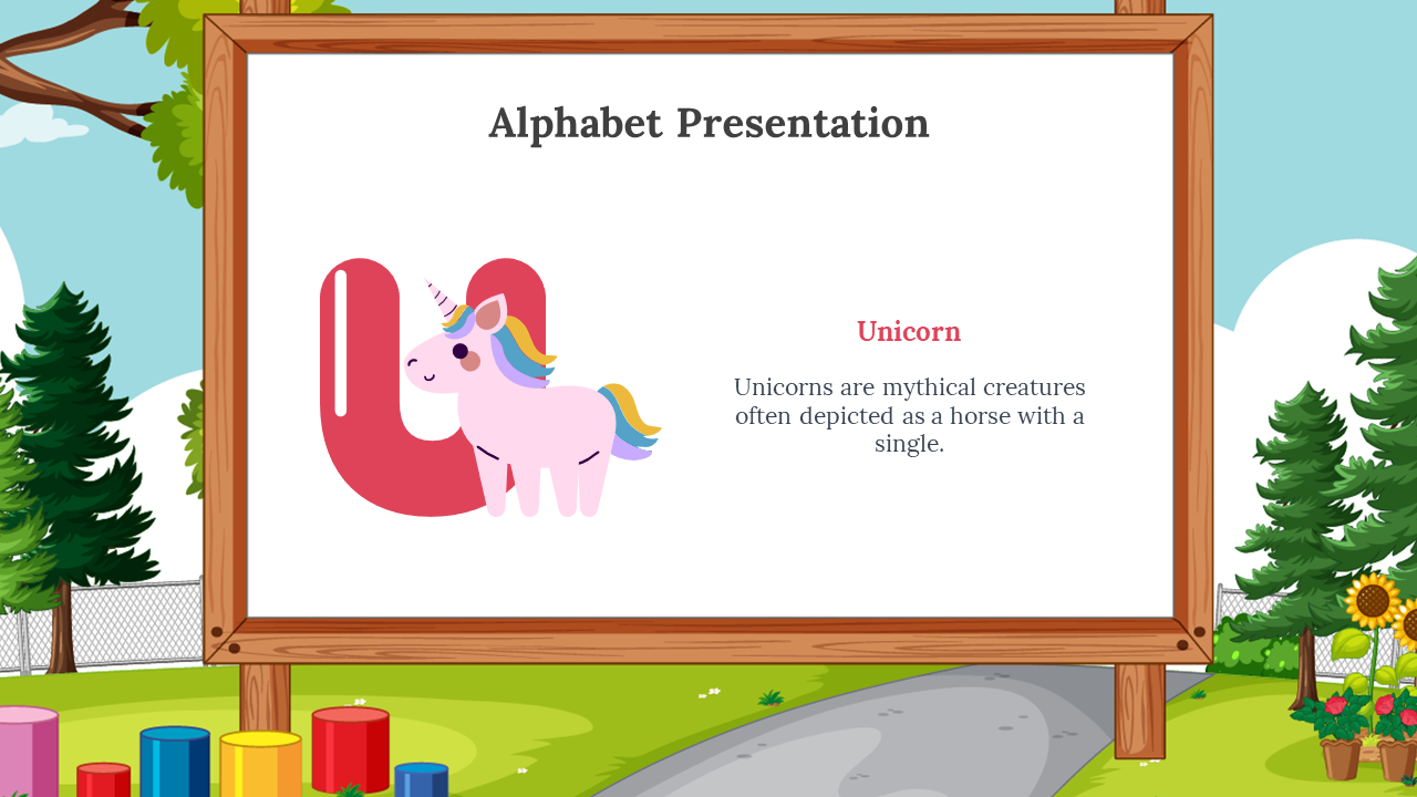 Pink U with a smiling unicorn illustration beside it, placed on a wooden framed whiteboard, on outdoor scene with trees.