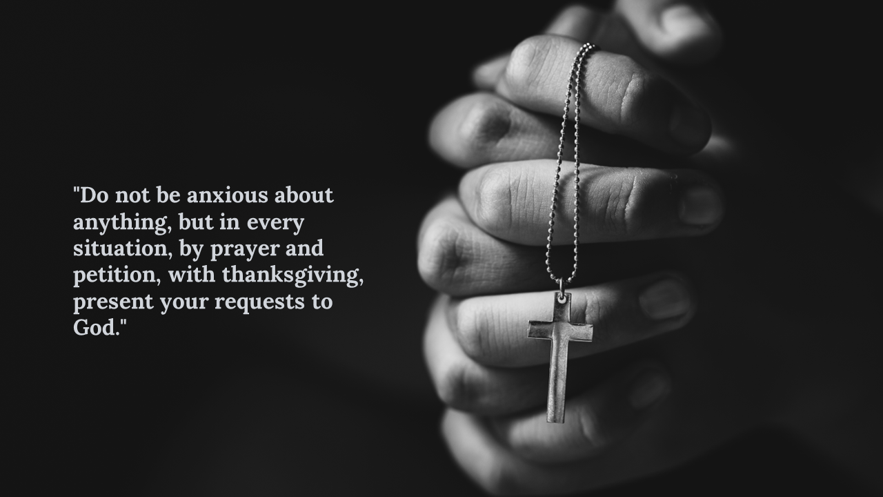 Monochrome image of praying hands gripping a cross pendant, dark background and centered scripture quote on the left side.