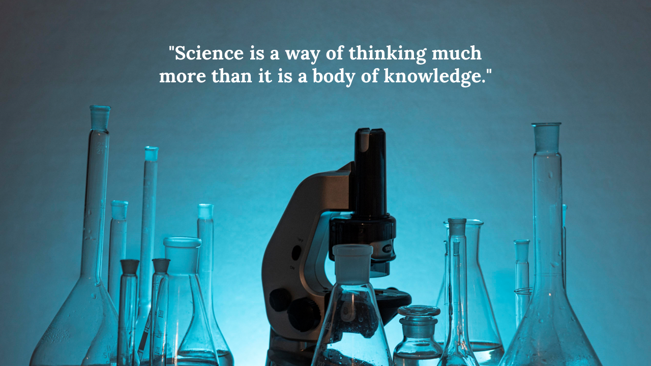 Centered black microscope among beakers and test tubes with blue backlight and quote text displayed above.