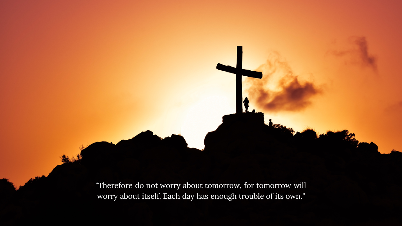 Cross monument on a rocky hilltop during sunset, with dark silhouettes and scripture verse overlaid at the bottom.