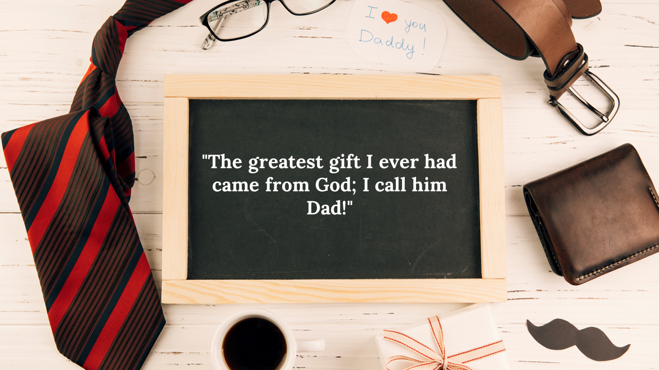 Framed chalkboard with quote for dad, surrounded by men’s accessories, gift box, coffee cup, and a red striped tie.