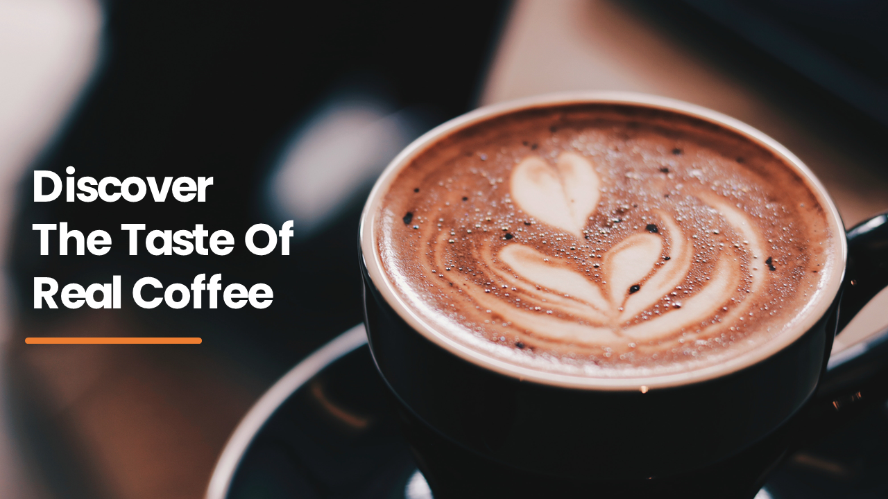 Cup of cappuccino with latte art on a wooden table, emitting steam, against a blurred dark background.