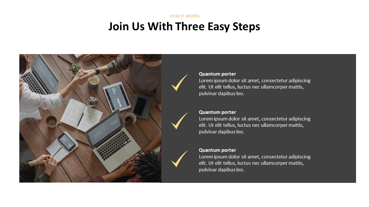 Business meeting with hands shaking across a desk, surrounded by laptops, tablets, notebooks, and coffee cups.