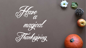Thanksgiving greeting card with elegant script text on left and autumn items like pumpkin, apple, pinecone, and flower.