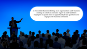 Town hall slide featuring an executive presenting to an audience with a description of the meeting format on a dark backdrop.