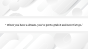 Minimalistic quote slide featuring a centered motivational message on a clean white and gray geometric background.