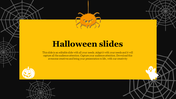 Dark Halloween slide featuring a yellow box with title, a hanging orange spider and white pumpkin and ghost icons below.