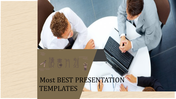 Slide showing a top down view of business professionals working at a round table, with a laptop and documents.
