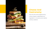 Toasted sandwich with layers of cheese, greens, and meat next to bold title and paragraph on cheese in modern gastronomy.