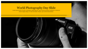 Photography Day slide with yellow title banner over black-and-white close-up of hand holding a DSLR camera with visible lens.