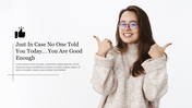 Minimal white slide featuring a smiling woman with glasses giving two thumbs-up, paired with motivational text.
