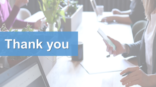 Modern thank you slide featuring a collaborative office scene with plants, laptops, and a blue text box.