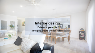 Modern home interior with a cozy white sofa, wooden flooring, and a bright dining area illuminated by chandeliers.