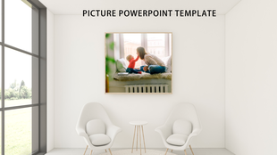 Picture template showing a cozy framed photo above modern white chairs and table in a bright, window lit room.