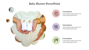 Baby shower PowerPoint slide with an image of hands holding tiny baby socks and decorative icons representing baby items.
