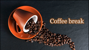 A tilted orange cup and saucer spilling coffee beans on a black textured surface, forming a flowing pattern.