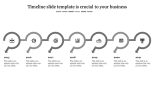 Grey themed timeline PowerPoint slide with circular markers for the years 2015 to 2021, featuring business related icons.