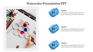 Watercolor themed PowerPoint slide with a palette of paints and brushes with captions on a white backdrop.