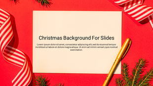 Red christmas background slide featuring a blank card with text surrounded by green pine branches and striped ribbons.