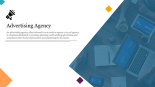 Slide with colorful geometric shapes featuring a blue tinted photo of a desk with laptops and papers.