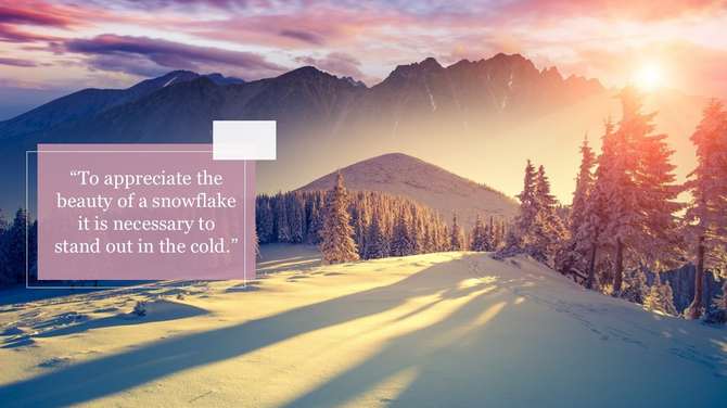 Winter landscape PPT slide with snow covered trees and mountains, featuring an inspirational quote in a pink box.