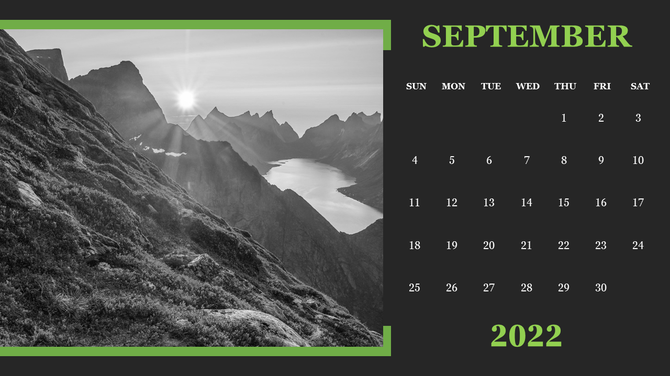 Black and white mountain landscape with sunlight over peaks on the left and a dark September calendar grid on the right.