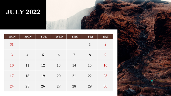 July 2022 calendar PPT template featuring a landscape background with a waterfall and rocky terrain.