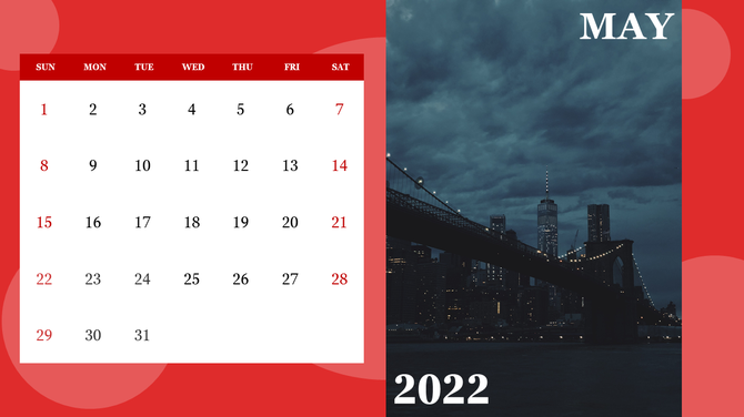 Red themed calendar layout for May 2022, featuring a white grid, and a night cityscape featuring a lit up bridge.