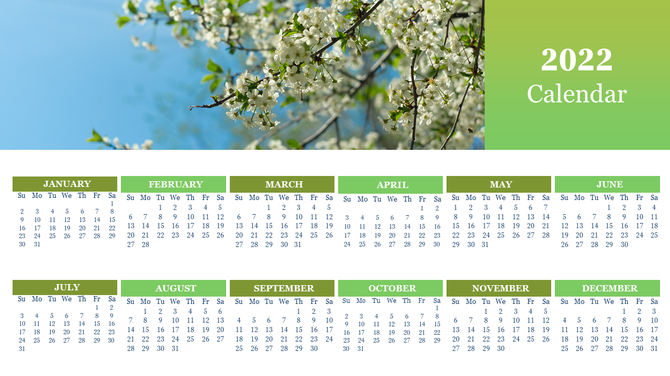 2022 calendar layout with green month headers on white background, and a floral image on a blue sky at the top.
