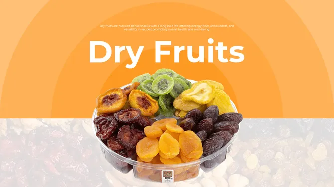 Transparent bowl of assorted dry fruits including dates, apricots, kiwi, and mango slices on an orange background.